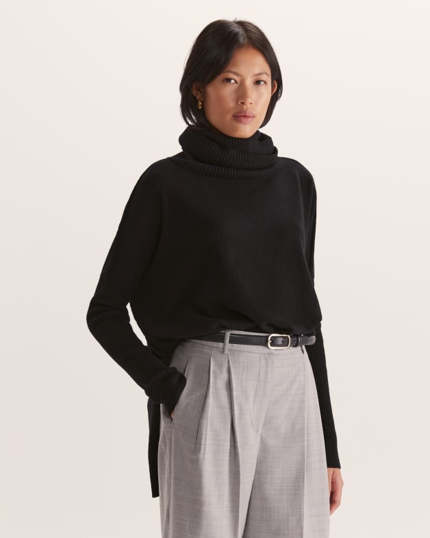 Claudia Merino Wool Roll Neck Knit in Black SABA