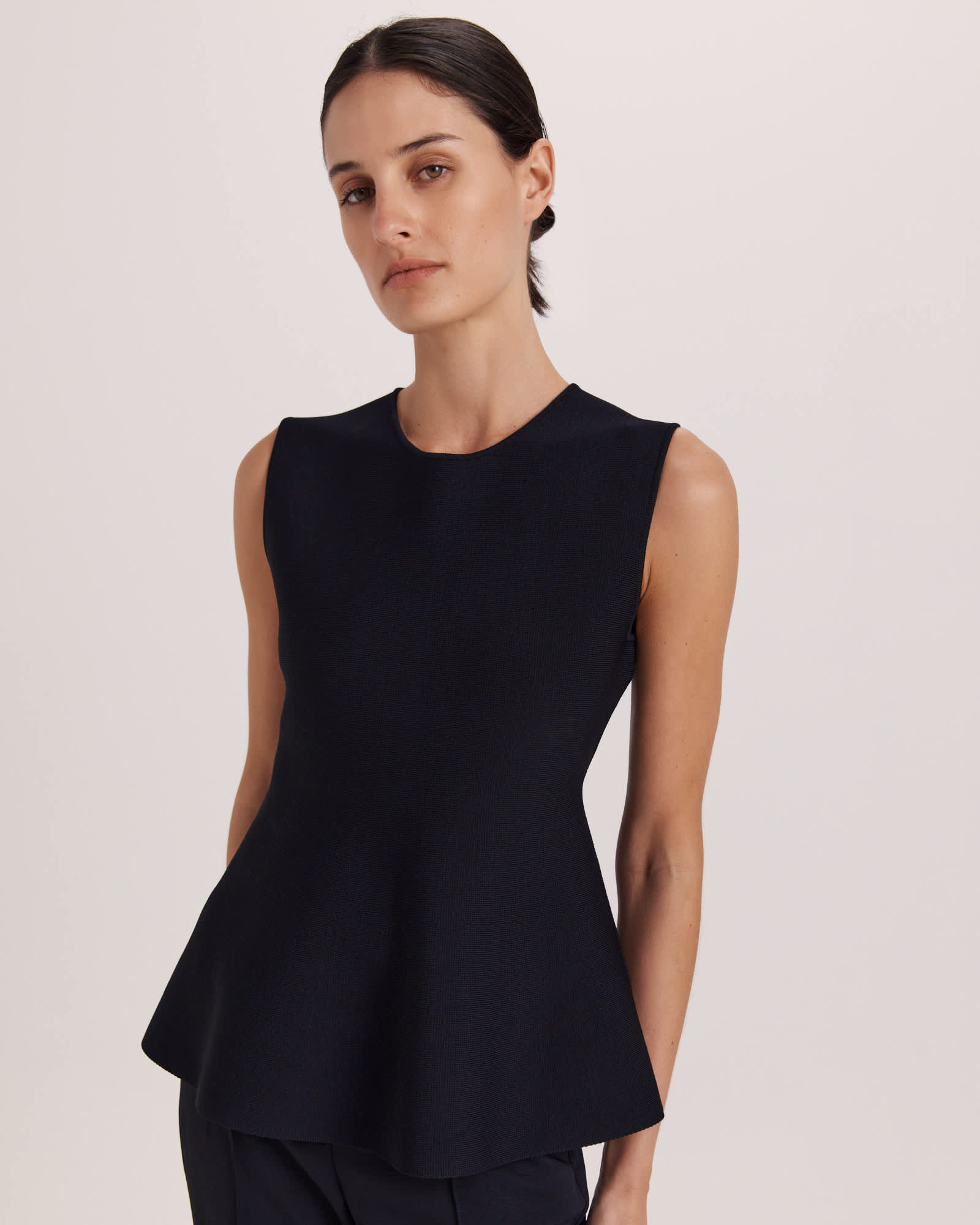 Mia Milano Peplum Top in Black - SABA